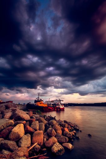 A mesmerizing shot of the dramatic cloudy sky over the port of Klaipeda, Lithuania