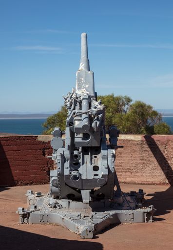 A vertical shot of the world war II era 3.7-inch anti aircraft gun mounted on Hummock Hill in Whyalla