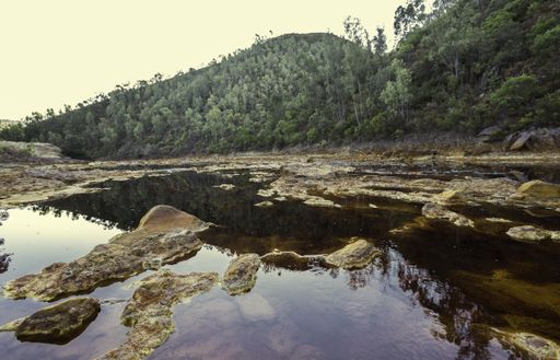 The Rio Tinto River with red acidic and polluted water due to mining, in Spain