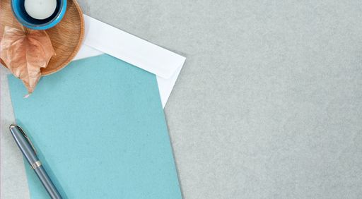An empty paper, an envelope in an autumn composition - mockup background