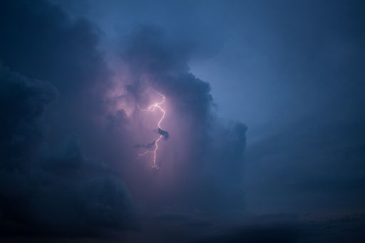 Belo Horizonte, Minas Gerais, Brazil - October 24 2021: Lightning burst through dense clouds above Belo Horizonte, Brazil