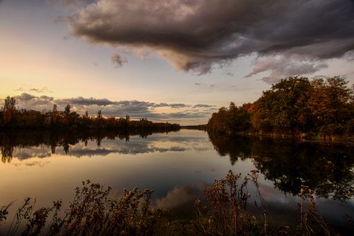A gloomy sunset over the lake in Autumn