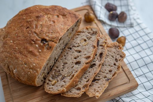 A delicious freshly baked bread on the wooden board