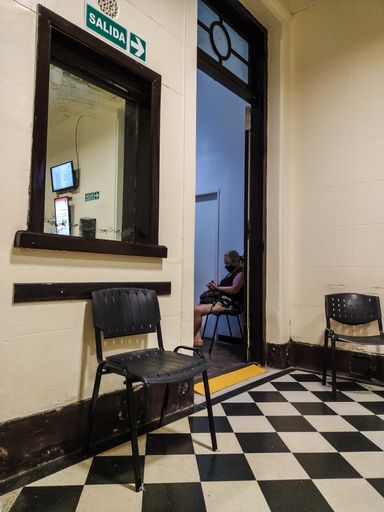 A vertical shot of the interior of a waiting room in Buenos Aires, Argentina