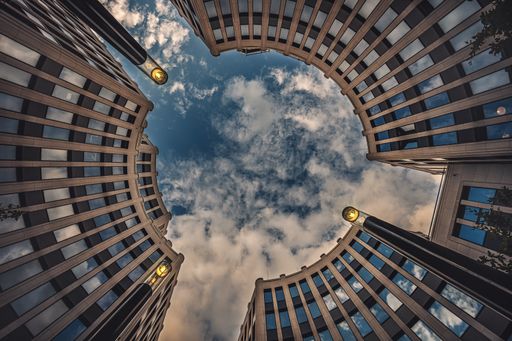 A low angle shot of Potsdamer Platz under a cloudy sky in Berlin, Germany