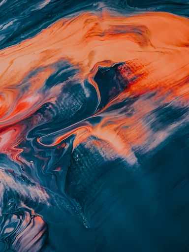 An Abstract pattern of an acrylic artwork with colorful paint stains