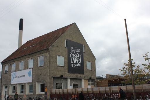 A beautiful view of an old building against a hazy sky in Copenhagen, Denmark