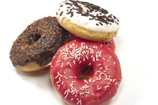 An amazing shot of tasty looking donuts with different glazes on them