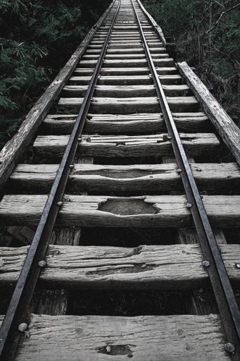 A vertical shot of a railway with old wooden sleepers, Oahu, Hawaii