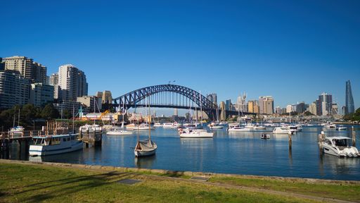 A beautiful view of boats and yachts moored in Sydney Harbour, Australia  on a cool autumn morning