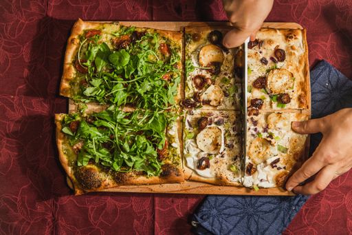 A traditional French food called "Tarte Flambee" or "Flammkuchen"