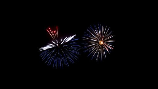 Fireworks that create abstract patterns on dark night sky. Black background with colorful lightning effects. Long exposure and movement.