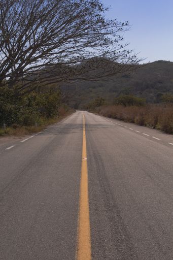 A long asphalt road near El Agucero WaterFalls in Chiapas, Mexico