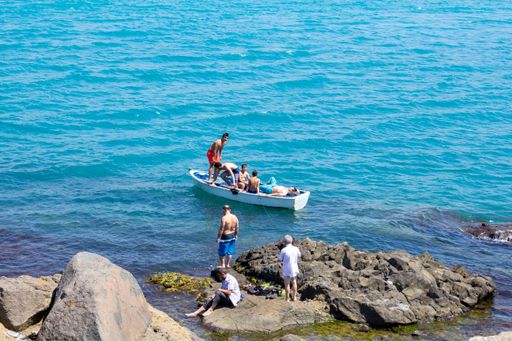 Young people in a boat in the sea, Istanbul, Turkey