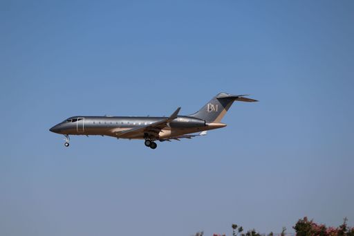 Bombardier Global 5000 landing at San Jose airport in the afternoon, arriving from Long Beach