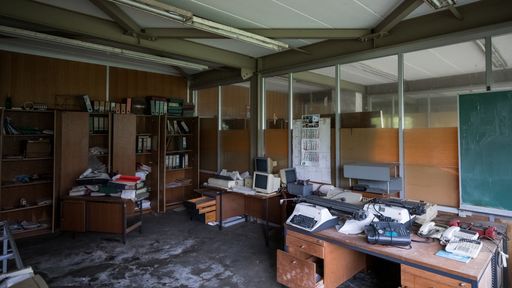 A messy office in an abandoned building