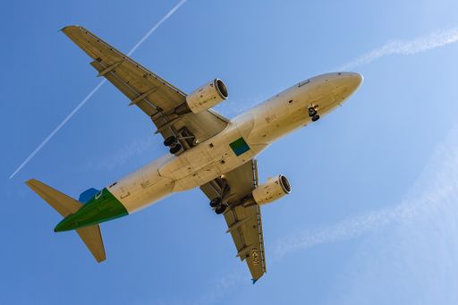 passenger plane landing, undercarriage from below (Low-flying)