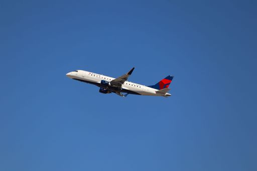 Delta Connection Embraer E175 takes off from San Jose Airport in the afternoon, en route to Los Angeles.