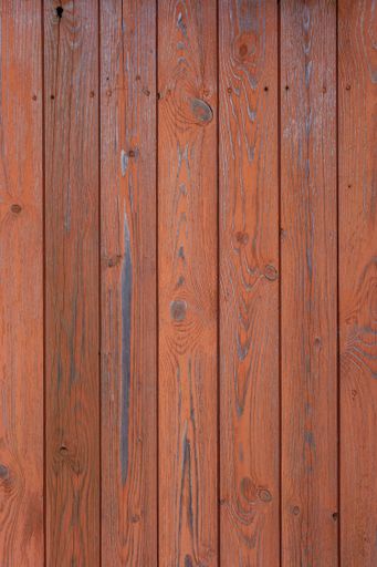 Reddish-brown wooden planks with texture, knots, and metal fasteners. Used as background, texture, or reference in visual projects.