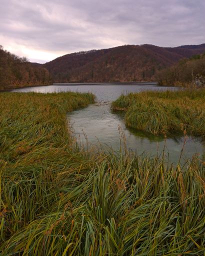 A beautiful view of the Plitvice lake district in central Croatia in an autumn cloudy weather
