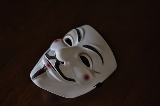 A beautiful shot of Guy Fawkes mask on the black background