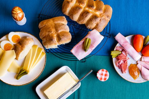A top view shot of breakfast on a blue background