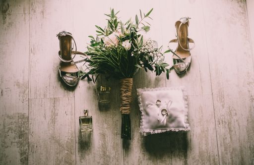 The wedding accessories of the bride on the floor.