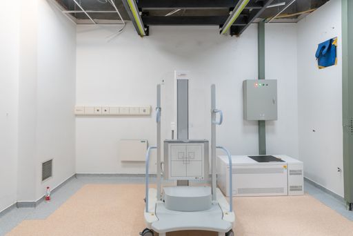 An empty room with Xray or CT scanner in a modern hospital