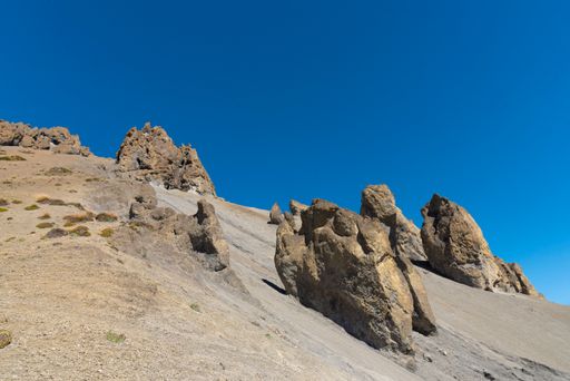 A beautiful view of stones on Annapurna mountain under a clear blue sky