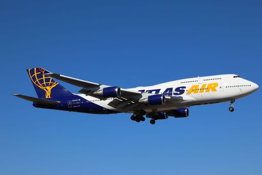 A side view of Atlas Air Boeing 747-400 arriving at San Jose airport
