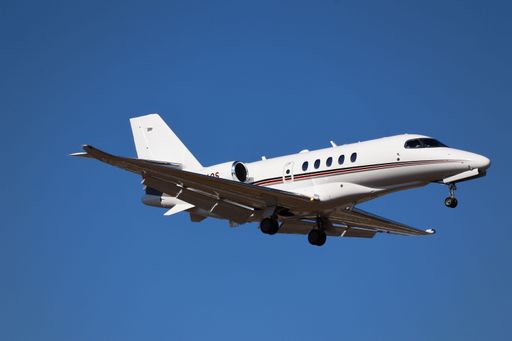 A side view of the Cessna Citation Latitude lands at San Jose airport from Denver