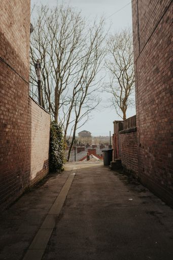 An alley between houses in North West English town, Preston