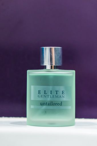 An Avon Elite Gentleman Untailored perfume in a spray bottle