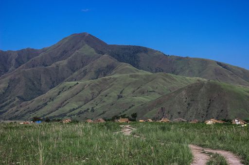 A beautiful landscape with green mountains under the blue sk