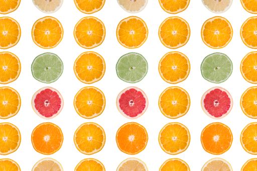 A set of fresh citrus slices isolated on white background