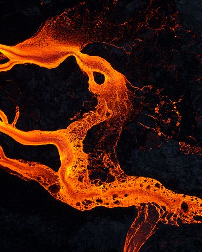A vertical shot of lava rivers from the active volcano