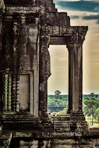A vertical shot of the ruins of the historic Angkor Wat temple in Siem Reap, Cambodia