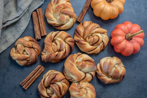 A top view of delicious homemade pumpkin spice cinnamon roll buns