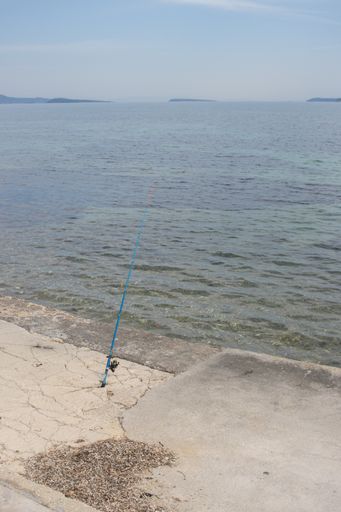 A beautiful vertical shot of a seashore and the sea - perfect for background