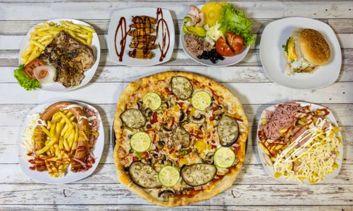 A closeup shot of plate of the delicious dishes  on the table