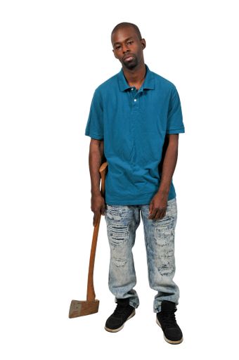A African American possessed man in a trance holding an axe isolated with a white background