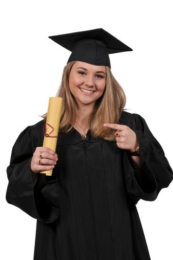 A Caucasian Young woman in her graduation robes isolated on a white background