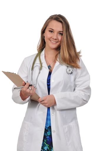 A Caucasian Beautiful young woman doctor in a lab coat holding a patient record isolated on a white background