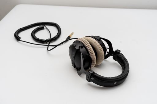 A closeup of DT770 Beyerdynamic headphones, studio headphones for professional music production on a white table in Berlin, Germany