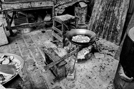 A beautiful grayscale high angle shot of a street food somewhere in Asia