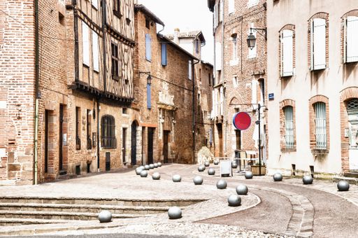A low angle shot of a building in Albi in France