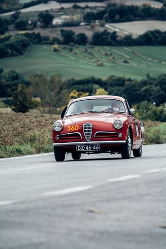 A vintage Alfa Romeo Giulietta sprint 1956 racing in Mille Miglia rally