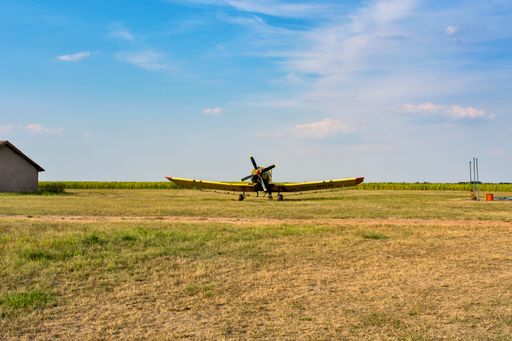The old plane in the green field. Zrenjanin, Ecka, Serbia.