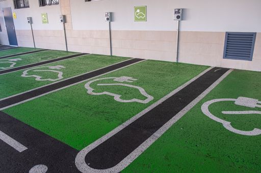 Filling station for electric cars. Car parking space reeserved to electric car recharging point.