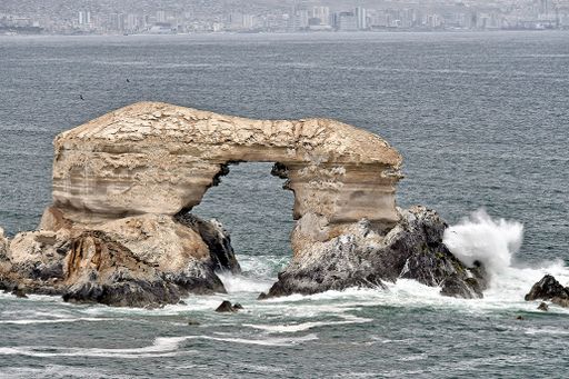 The natural arch on the coast of Chile called La Portada in summer